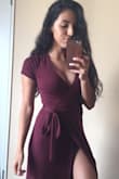 I LOVE this dress! It's so soft. It's a little too heavy for summer, but I love it nonetheless. I honestly want to buy it in every color! The slit isn't too much, when I walk I don't notice that my leg peaks out, which is fine with me. However in a posed photo, it can be slightly adjusted to do so. - Amy P.