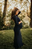 Loved this dress. Got it for my maternity pictures, so it was a little snuggly, but SUPER stretchy. Can't wait to wear it post baby. - Michelle H.