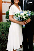 Read the reviews about it running large so I bought an XS when I'm usually a small. Wore it for the ceremony to make my marriage official in the church. Was very simple and elegant. - Emma P.
