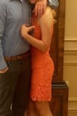 I wore this dress for a wedding and it was absolutely perfect! It's the perfect balance between casual and classy. I usually wear a small, but after reading the reviews I decided to get the medium. Personally I felt like I could have went with the small but the medium was super comfortable and I was able to eat and drink all night without feeling like a sausage. It was the perfect length and really easy to dance the night away in! I got plenty of compliments on the color and the dress itself. - Kerry E.