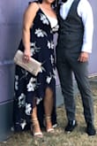 I was attending a Catholic wedding so I even ordered up a size in hopes the extra wrap would compensate for the low cut, but NO! Not at all!... I ended up putting a lace bandeau under bc I didn't have enough time to find something else to wear & it did work alright, unfortunately it kinda took away from the dresses beauty... however, without it, unfortunately it isn't very elegant as seen in picture due to the extremely low cut (seems it's only made for those who have a figure like the model)
I wouldn't recommend this dress for this reason! - Barb P.