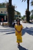 From my pic, u can see the dress is baggy at size XS. The color & material are ok. I feel comfortable wearing it. - Annie D.