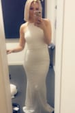 I ordered this dress for my wedding and it fits like a glove, hugs my curves beautifully ! So happy with the quality of the dress, material is thick and lace is beautiful. It is way too long even with heels but that's an easy fix :) - Alyssia M.