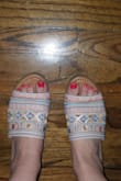 Love these sandal slides. A bit on the narrow side so beware of this if you have a super wide foot. Adore the embellishments, colors, and style! A steal for $20. - Taylor G.