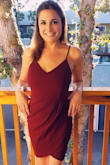 Very pretty dress. I'm normally a small but I'm glad I got a medium because even a medium is a little snug. Nice material and shows off my curves nicely. - Erica E.