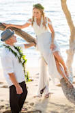 We decided to elope in Hawaii and I didn't have guests or anything for this, our 2nd wedding each.  So it was going to be simple, somewhat casual...but I still had a craving for a little chiffon train and I found a used designer dress on Ebay that was like...size 0000.  Um...not gonna fit me...ever.  So instead of just throwing it away, me and my tailor snipped off the train and did this fantastic overlay on top of the Oceans of Elegance dress.  Two fit issues easily worked around: the bodice, like another reviewer mentioned, is just a bit tight around the ribs and it's kinda tricky to zip up without hurting yourself, but it provides great support once on, and is plenty comfy.  The cups have a deep V but it still looks classy.  I had to have the straps shortened a bit.  Take a look at my pics!   It was a stunning gown. - Michelle P.
