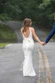 I am obsessed with this dress. I bought it to wear for my wedding and it was everything I wanted. It's so comfortable and there is more of a train than the pictures led on, which I loved! Just had the length hemmed a little and added a lace belt sash on the waist. Add a veil and it's the perfect wedding dress! - Brittany J.