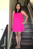 It fits great, great hot pink color. I feel comfortable wearing it, especially summer time :) The dress does give me nice shape, not baggy, not showing any tummy :) - Annie D.