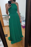 This dress is gorgeous. I love how it flows when I walk. For sure, it needs to be hemmed. The bodice is a bit loose on me (I'm small chested), but it covers the side of my body enough where I do not have to worry about side boobs showing. The green I got is a bit more toned down than in the picture. It's a beautiful color. I cannot wait to wear it. - Jenny L.