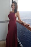 Wore this on a cruise for elegant night and got multiple compliments. An extra small probably would have fit better but I was able to make it work! I absolutely LOVE how flowy it is! I am probably going to order another in a different color and in an x-small. - Chrissy D.