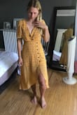 I loved this dress and really wanted to make it work but the chest was super big on me and looked funny when I tried to pin it. Will be returning unfortunately:( I don't think I could have sized down because it fit my waist perfectly - Monique S.