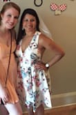 The fit is perfect and it is so flowy and flattering. There is a slit in the front, but it adds to the flow of the dress and isn't very revealing. 

You would need to skip wearing a bra for this dress since the back of the dress is a bit close cut, but the material is nice and thick so you won't show through. - Alanna P.