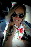 This is a beautiful feminine top!! Again with the ability to customize the fit overall is an added bonus! The material is not cotton like the sister tops that are also available in Navy and White.  This material is dressy, like a silk/polyester feel. Definitely looks great with shorts, skirt or jeans!! Another pleased purchase!! - Daina E.