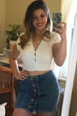 I love this shirt! I think it's a classic, but the open back adds a fun touch. And the buttons give it an overall feminine look! Very breezy, material perfect for summer! - Yusnavy R.