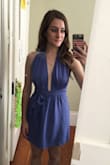 I ordered a size smaller than I usually wear since the top is so open and I have a small chest. If I had a larger chest I think it would have fit perfectly but it felt just a little too billowy. I wore this without any fashion tape and it was fine, but I think I would add that next time I wear it - I didn't have any flashing accidents but it would have helped the front hang in a more flattering way I think. One side seemed just a little longer than the other so I kept having to adjust it. It's easy to adjust the front to either show a lot of skin up top or have the two sides pretty much touching for a less exposed look. This fabric wrinkles very easily so don't pack it without access to an iron or steamer! Overall I really liked how it looked and it was perfect for wine tasting on a hot summer day. - Laura B.