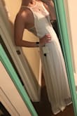 Dress is beautiful!! Got for my rehearsal dinner and it's the perfect combination of sexy and elegant! I read the others reviews and saw most people said it ran big so I got a small, and really I probably should have gotten XS and still be okay. The small fits fine just it is just a bit baggy in the torso. I would recommend sizing down! - Eden G.