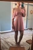 There are darts in the breast of this top, so smaller chested girls may have a hard time filling it out without the front sagging. I was going to return it but I may give it to a friend. The color also did not compliment my olive skin tone too well. Still a very pretty dress. - Sarah B.