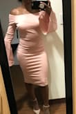 The small was a little snug on me so I should've ordered a medium like I knew I should have. But if you're a true small, this will fit perfectly. The material was great and I loved the bell bottom sleeves. - Evelyn C.