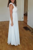 The dress fits nicely around the waist, but is loose around the breasts (the cleavage is way too big). I will have to fix it a bit. The length is actually great, I thought it would be too long, especially considering my height (1.64), but I'm quite happy. I will have it as a wedding dress on a beach. - Ana N.