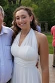 Got this and several others as a possibility for my rehearsal dinner, but this was hands down the winner. I'm pretty busty, so the dress does not stay up on its own without the convertible ties, but with them it stayed perfectly in place and everyone could not stop raving about how beautiful this dress was! I just tied the straps like a halter (had to make it a bow since they were so long). Gorgeous dress - Lexi G.