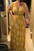 Flatters figure and fits very nicely. Dress was a litttle long but was easily fixed wearing high heels - Lenna C.
