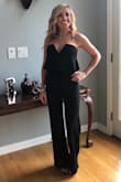 The extra small fits perfect everywhere, except for the length in the hem. I had to have 5 inches of the romper hemmed. - Rachel S.