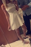 Love the fit, material, look. I got several compliments. This was a perfect dinner dress for my honeymoon. It was definitely wrinkled when it got here, but easy problem to solve. - Kelli H.