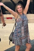 This dress is adorable. I love the pattern, colors, and style. Unfortunately it does run large. I still wore it out but I wish it wasn't so baggy, I may get it tailored. - Nina K.