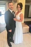 The dress was perfect for our Vow Renewal! It is gorgeous in person! I ordered a Medium and it zipped perfectly! The top was a little loose but due to time restraints I didn't get to have it altered. I loved the classy feel it has and the slit to make walking easy. I hemmed about 5 inches off, even with my 4 inch heels! So if you are under 5'10" WITH heels, expect to hem it! The material quality was spectacular and thick enough to not have to worry about it being see through even in the sunlight. I would recommend this!! To anyone!! - Tara P.