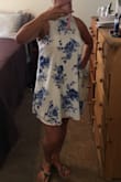 Based on other reviews, ordered one size smaller than I typically would, which is unusual for me because I always go with a it's easier to fit into something larger than something too tight. This dress is comfortable all over! Just the right length for a little sexier look but not too short that you'd feel uncomfortable. Highly recommend it! - Hayley T.
