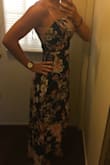 Beautiful dress! I bought it to wear to a September wedding and can not wait to wear it! I love the uneven top! It gives it a unique look. My only complaint is there is no give in the fabric and the dress runs a little small. - Julie M.