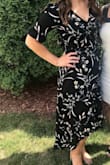 This dress is so beautiful and I got a ton of compliments on it! I ordered a size medium and the sleeves were a little tight and the neckline was too big. I just pinned the neckline together and it worked perfectly! I would highly recommend this dress! - Hayley T.