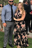 Absolutely beautiful. The dress is pretty dark but still classy. I wore to a wedding and received tons of compliments. - Karyn S.