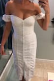 I wanted to love this dress so badly. And after reading the reviews I decided to get the small and the medium to see which would fit better. Sadly, the small was a struggle to zip up. The corset build into the dress is super cool but it ended at my hips leaving my hips splurging out. And the medium was too big on me and looked box-y. HOWEVER, if you're a little bigger or a little smaller, I'd recommend. It's a super cute & well made dress. But both went back for me:( - Jillian B.