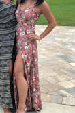 I've worn this to two summer weddings and have gotten so many compliments on it. I do safety pin the front so it is not as low cut. The slit is just the right amount. Love it! - Kim A.