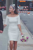 I absolutely love this dress! Wore it for my courthouse wedding and got soooo many compliments. It was tight but I wouldnât have gotten a bigger size because it hugged in all the right places. The only thing I needed was to get it cut a little shorter to fit just above the knee otherwise it was about an inch below and made my legs look shorter. Otherwise awesome dress! - Yanina G.
