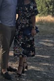 This dress is gorgeous!!! It's very feminine and the material feels expensive. I wore it to a conservative weddding and it was perfect. I love this dress, so glad I found it! The pictures really don't do it justice. - Mya D.
