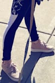I love these shoes a lot. They are very comfortable and look good with athletic wear. They are a little long and my toes have PLENTY of room at the top, but it doesn't bother me enough that I would want another size. Overall, a great buy. - Kate S.