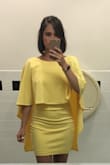 Bought this to officiate a wedding (preapproved by both grooms). I have never had so many compliments about any outfit in my LIFE (and that includes from my own wedding dress). Like I'm pretty sure I have to be buried in it now.
I'm afraid that after this dress runs out, Lulus won't make any more of them - please rethink this! Letting this dress burn out is a disservice to womankind!
Fit: I usually wear either XS or S. I bought the XS - WAY too small. Couldn't even get my butt in it, and while my butt isn't nonexistent, it's not like there have been any songs written about it, yknow? The small fit MUCH better. It will ride up a bit as you walk, so taller ladies may want to size up, because my short ass was tugging it down every so often. This is the only backless dress I've found where I don't have to wear a bra - the lining is tight to the skin, and anything I might be freaked out about normally is covered by the draping material. And I allllways wear a bra! It's very revealing in my personal least favorite area, my lower belly, but I just didn't care because the rest of it was so awesome. I suppose you could Spanx it up if you wanted. The material was thicker, and the dress was a great quality overall for something so inexpensive. If it's available and it's in your size, just do yourself a favor and buy the damn thing. - Elizabeth D.