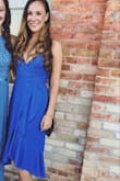 Loved this dress despite some of the reviews.  I had so many compliments at the wedding I attended.  It was a more royal blue than pictured, and it does have a low cut but worked perfect for me xox - Gill K.