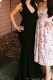 This dress is incredible. The fabric is very high quality, thick and forgiving yet still stretchy and comfortable to dance and move in. Has a short train in the back to add elegance. Made me look thinner and taller, I received so many compliments. I was a little concerned about the plunge neckline but it was still tasteful for as sexy as it is. Can go without a bra or use tape/cup inserts. I am 5'3" and had to get it hemmed, so be prepared if you're petite. I washed it in the washing machine afterwards and hung dry and it cane out perfect. Overall, I could not have been happier with this choice and Lulus! - Brianne M.