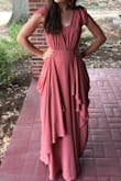 I bought this as a bridesmaids dress, and I am very happy with it. I does run on the small side; I would usually buy a size small but this medium was perfect for me. This is functionally a strapless dress; the straps are only decorative, not practical. I tightened mine so that they wouldn't keep slipping off my shoulders. As strapless dresses go, I found it comfortable and secure.
This dress comes very long, so unless you're very tall or wearing 5 inch heels, count on hemming it.
We were going for that mismatched bridal party look, but I knew that at least one other girl had ordered the same dress. So I found a way to make mine a little different by picking up two spots on the front of the skirt to the waist. (If that is confusing, see the picture.)
All in all, after 3 alterations, and in spite of the fact that I would never have chosen to order it for anything else but a bridesmaid's dress, I was very satisfied. - Kayla R.