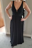 Overall very happy with the quality and fit of the dress. It is too long even with 4 inch heels so will have to hemmed but better too long than too short. The bust and waist are very flattering - Chelsea H.
