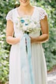 After looking for so many options and reading a lot of reviews to find the perfect dress for my outdoor wedding, I found this dress beautiful, it was the best one that fitted regular people (Pictures posted by customers are the most helpful). I got it really quick and was love at first sight. It was a little bit long, but I didn't care (not time for cutting it). To my waist was a little bit tight, because I am a little bigger that I normally are, but wouldn't go a size bigger since the top part was exact for my breast size. - Sara A.