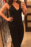 I've always loved jumpsuits and rompers, but they never seem to fit me. They're always either too short but fit my body, or fit length wise buy are too baggy. I saw reviews from others around my height saying this jumpsuit was long enough so I decided to take the leap. I ordered a size up hoping it gave some extra length and it was plenty long enough. I probably could have gotten a large, but the material is stretchy so even a size up still fit tight to my body and felt comfortable. I wore this out for a friend's birthday and got SO many compliments on it. It is a little revealing in the chest area, so that's something to note. - Maddie B.