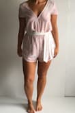 This has become one of my favorite beach cover ups this summer. It's baggy and dries quickly but is cute enough for when you're still out and the sun goes down. I did add my own little sash belt to it because the elastic band is unflattering. - Kelly L.