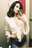 This was in my first order from LuLus. My first impression was that it arrived extremely wrinkled which made it seem very cheap and worried me. But... after ironing I started to love it. Looks great with a long layered necklace.
** Update: I only got to wear it once because it shrunk in the wash.** - Casey H.