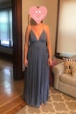 This dress is incredible. It fit exceptionally well - but I would say you might want to size up. I am typically a medium in shirts, but I got a large and the middle section fits like a glove. The dress is very long, I am 6' tall and you can see in the photo that it just hits the floor! (I am not wearing shoes). You really don't have to wear a bra with it which is awesome and the straps are adjustable for a more custom fit. The color is a little darker than what appears on the model, but I honestly like this color way more. I ordered this and another dress and my friends deemed this the clear winner! *I also would like to add that I received the dress with a tear in it and Lulu's customer service was exceptional at working out the issue! - Morgan C.