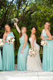 I actually did not wear this dress, but order it for my bridesmaids. It was perfect for our destination wedding and made it easy to fit multiple girls of different sizes. Also, all my bridesmaids lived within different states and it was easy to order, them try, and exchange sizes if need. The girls did recommend double side tape though. - Delaney N.