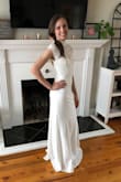 Before I begin talking about the dress, I would like to say how great my shopping experience was with Lulu's! I've even come back a second time for my Bachelorette dress! What a smooth, stress free, shopping experience! Now onto the dress. It's amazing! I measured as an XS (going off the size chart that's provided), but my waist was measured at a S. I was a little hesitant with continuing with checkout, but I did it and couldn't be happier. This dress fits like a dream. The weight of the fabric is thick and slightly heavy, but incredibly comfortable and has a little stretch to it. Which was great for my waist! Thank you, Lulu's! - Ashley C.